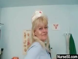 Aged Blond lassie shows Off Natural Tits And Dildo Skills