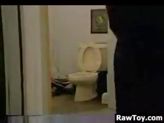 MILF Masturbates With A Plunger In A Bathroom