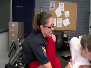 Two cops sucking pecker on duty